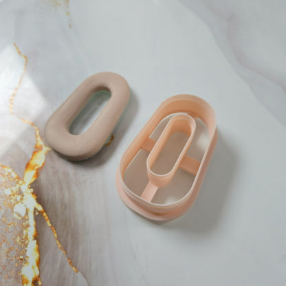 Emporte-pièce ovale élargi avec trou ovale pour pâte polymère et argile 30 à 50 mm