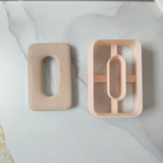 Emporte-pièce rectangle aux bords arrondis avec trou ovale pour pâte polymère et argile 30 à 50 mm